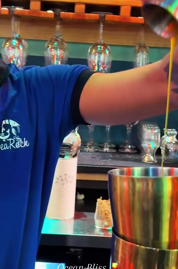 Seafarers' Painkiller - Dark rum, pineapple, coconut cream, orange, a dusting of nutmeg - served at SeaRock Bar & Restaurant, George Town, Grand Cayman
