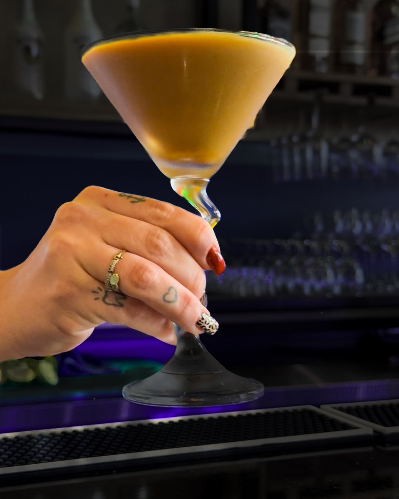 SeaRock Rum Punch - Aged Caribbean rums, passion fruit, lime, bitters and grated nutmeg - the house pour - served at SeaRock Bar & Restaurant, George Town, Grand Cayman
