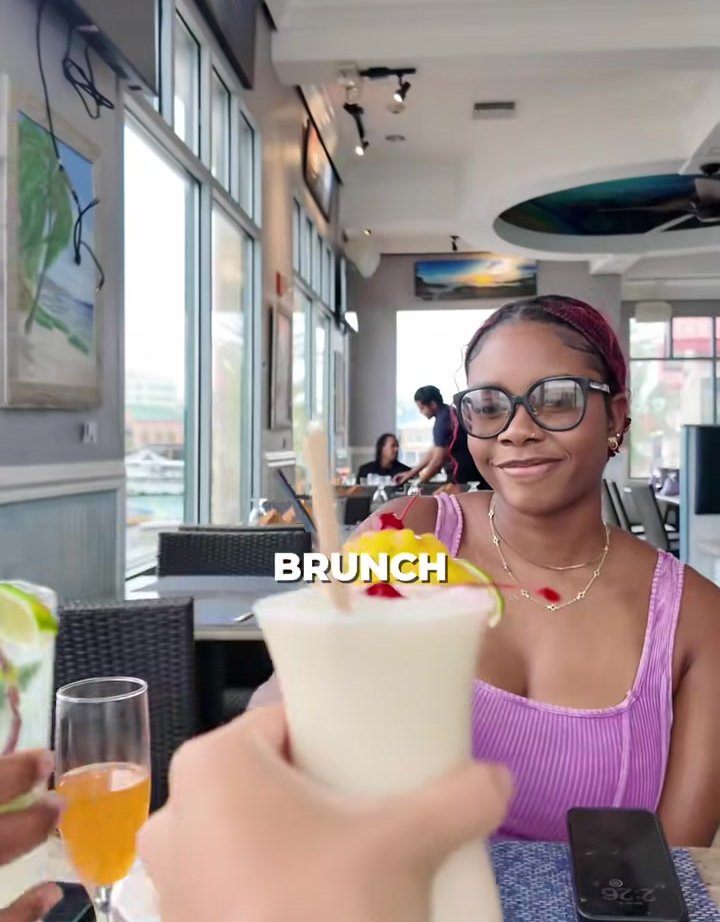 Conch Shell Colada - Aged rum, coconut, fresh pineapple and a toasted coconut crown - served at SeaRock Bar & Restaurant, George Town, Grand Cayman